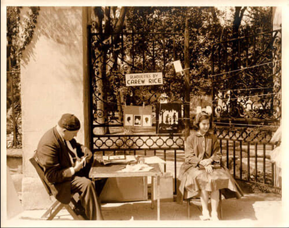 sepia photo of carew rice making a young womans portrait